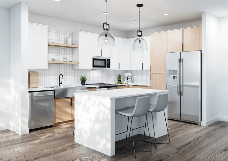 A kitchen with a center island and a refrigerator